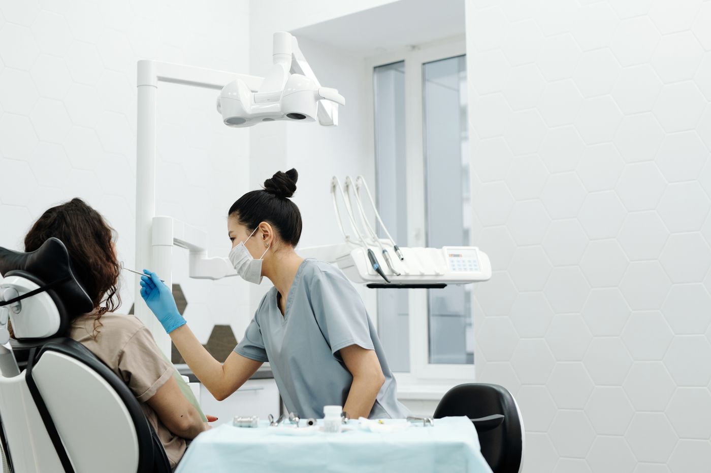 Dentist looking after a patient in a dental clinic